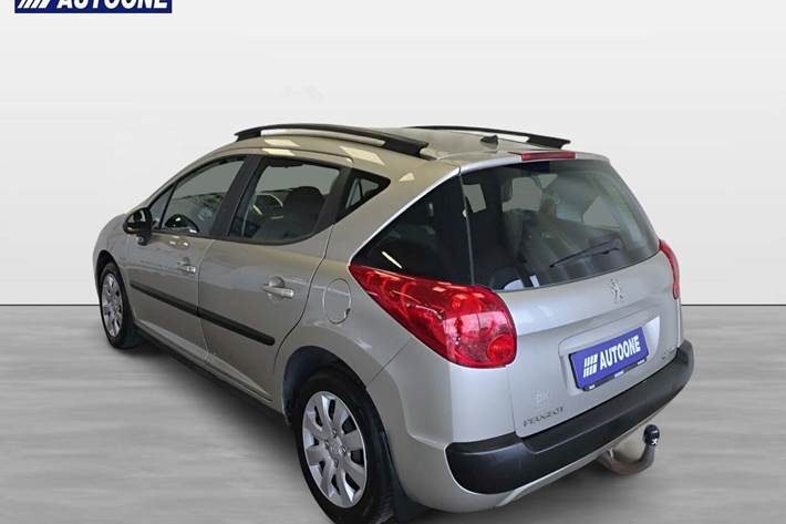 Orange Peugeot 207 fra 2009