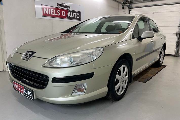Orange Peugeot 407 fra 2006