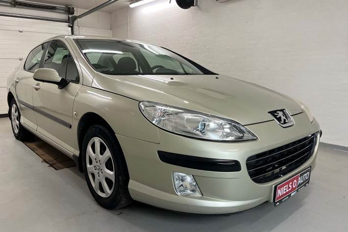 Orange Peugeot 407 fra 2006