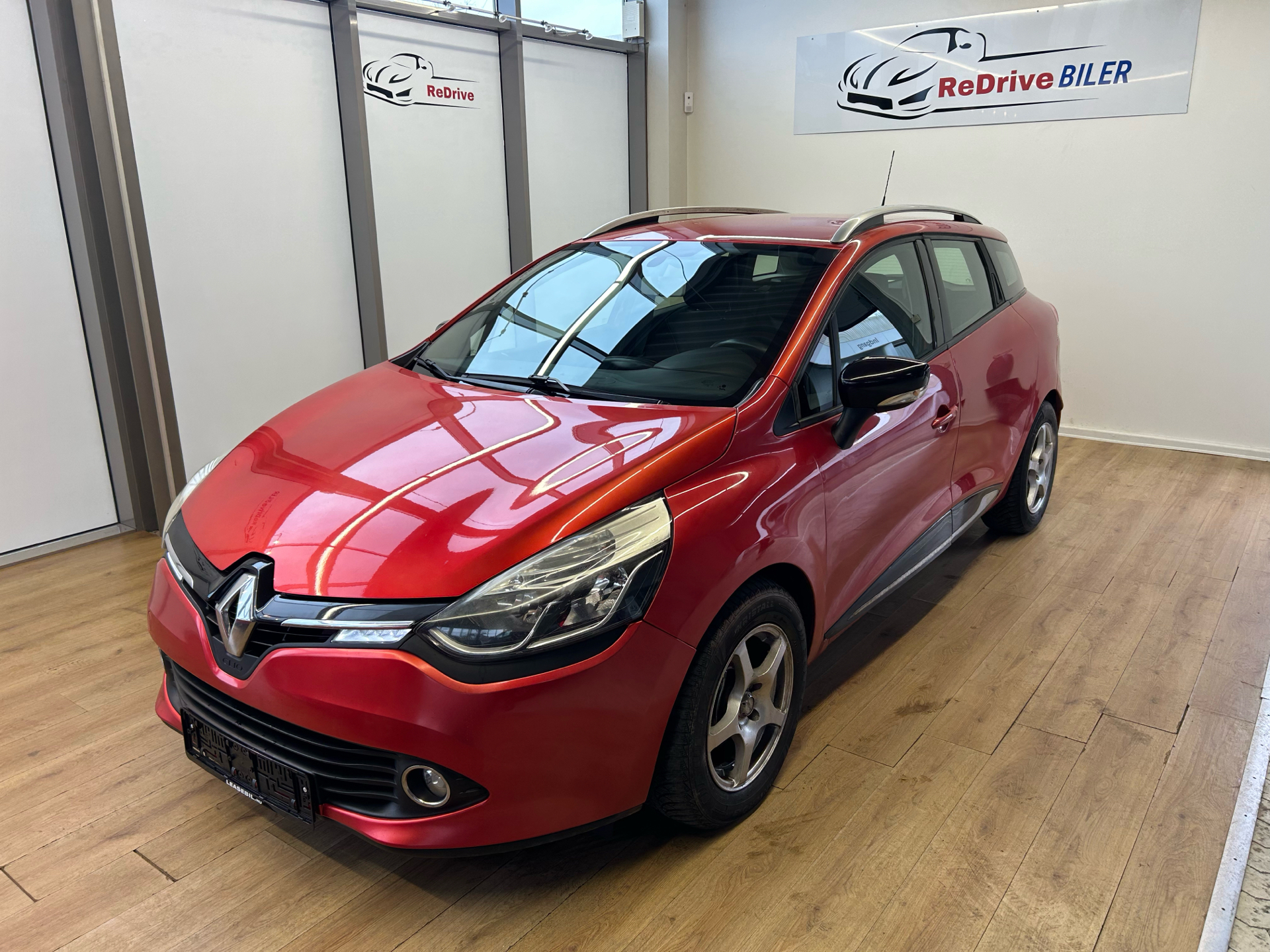Rød Renault Clio fra 2014