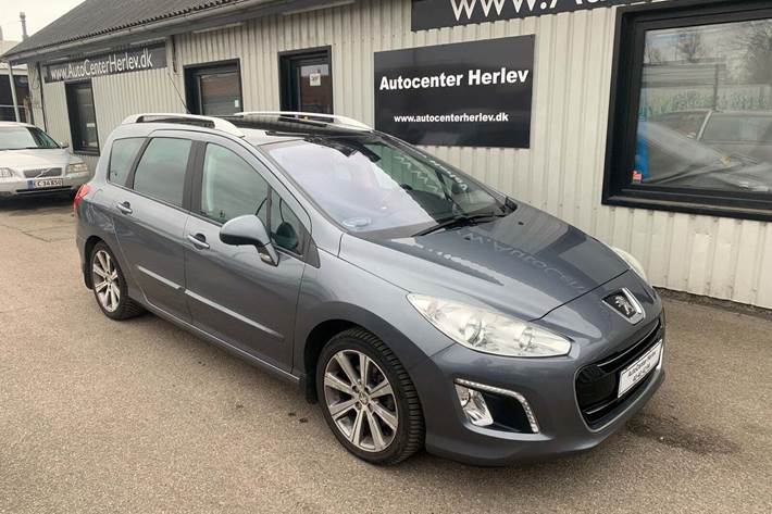 Grå Peugeot 308 fra 2012