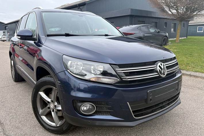 Gul VW Tiguan fra 2013