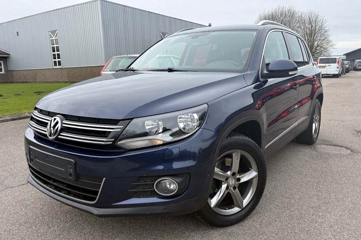 Gul VW Tiguan fra 2013