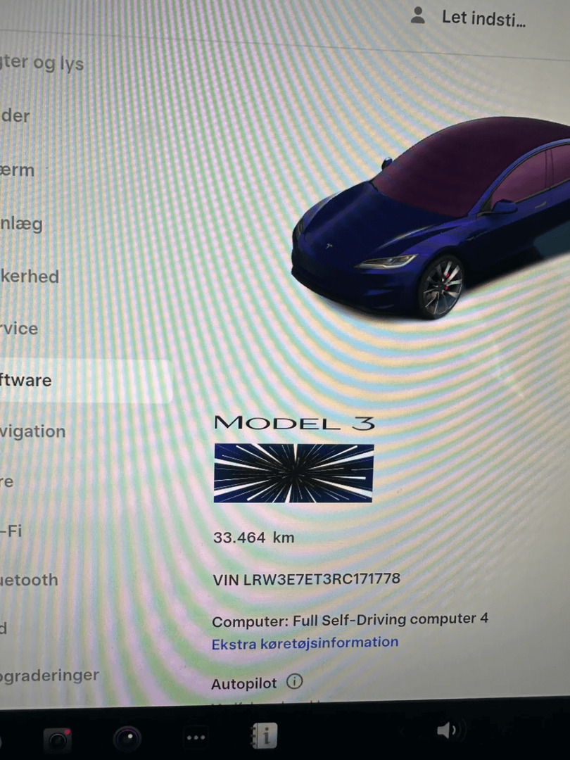 Grå Tesla Model 3 fra 2024