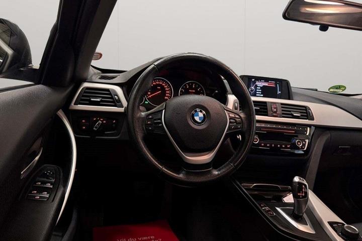 Grå BMW 320d fra 2016