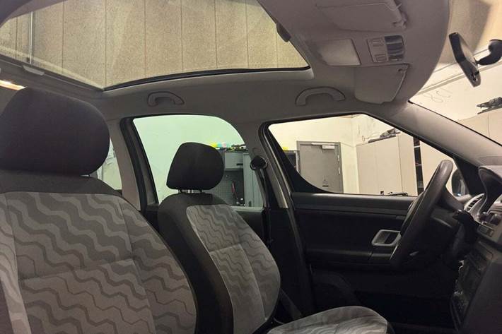 Orange Skoda Roomster fra 2010