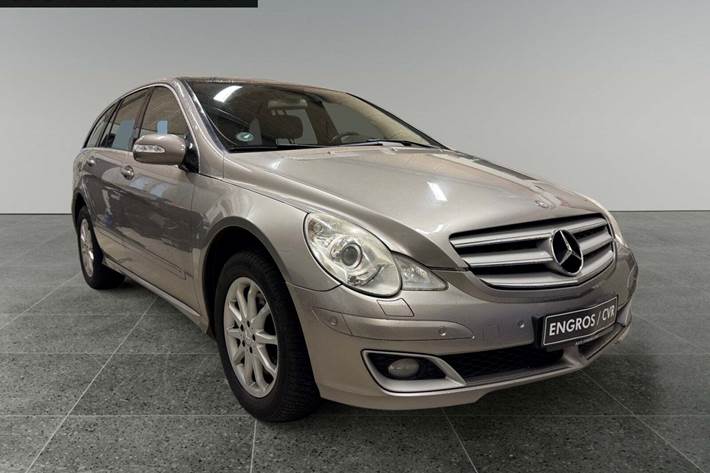 Orange Mercedes R320 fra 2006