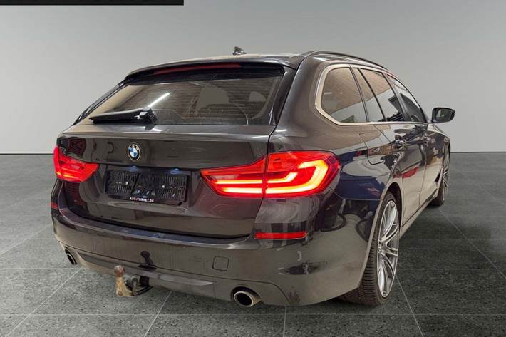 Grå BMW 520d fra 2018