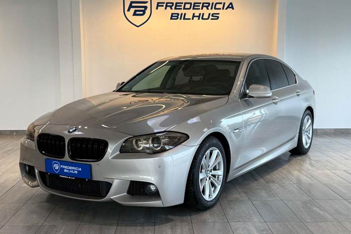 Beige BMW 520d fra 2013