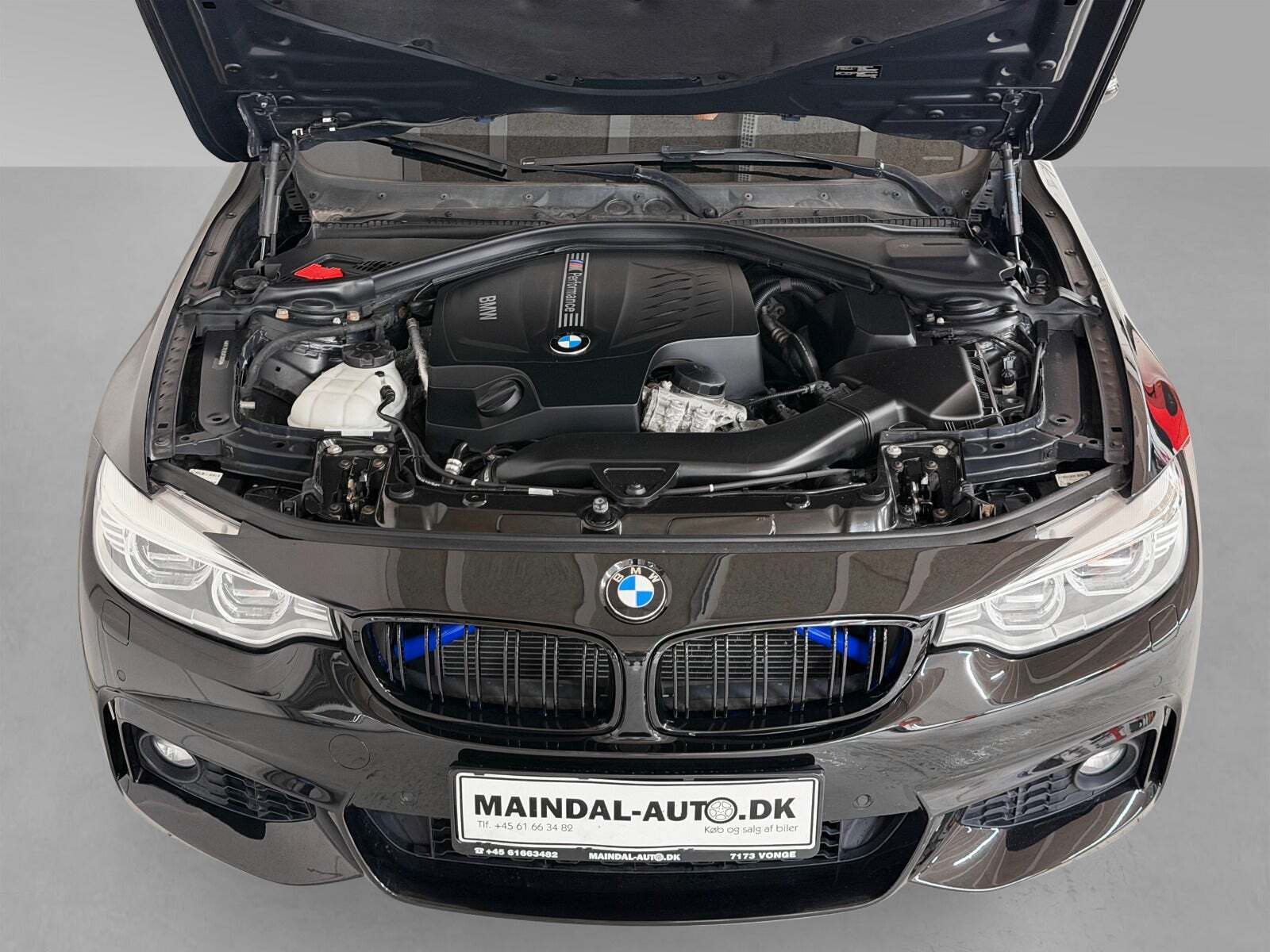 Rød BMW 435i fra 2014 set udefra