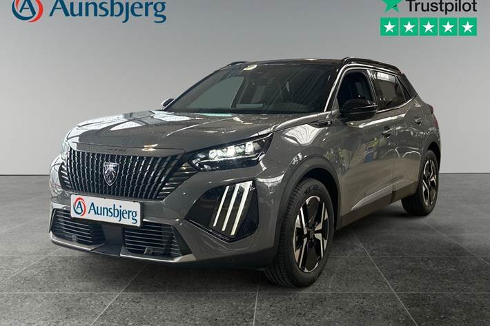 Grå Peugeot e-2008 fra 2023 set udefra