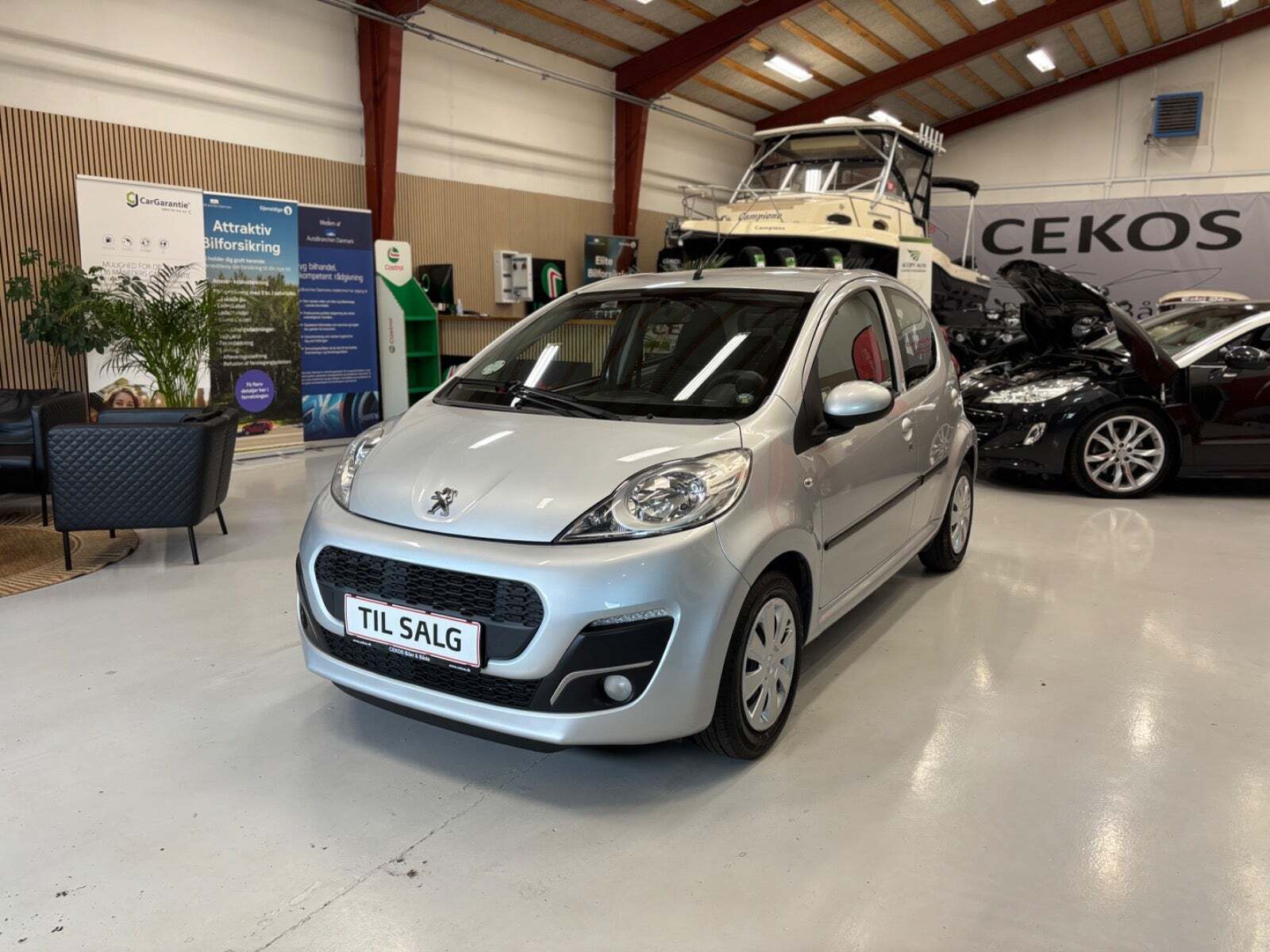 Sølv Peugeot 107 fra 2013