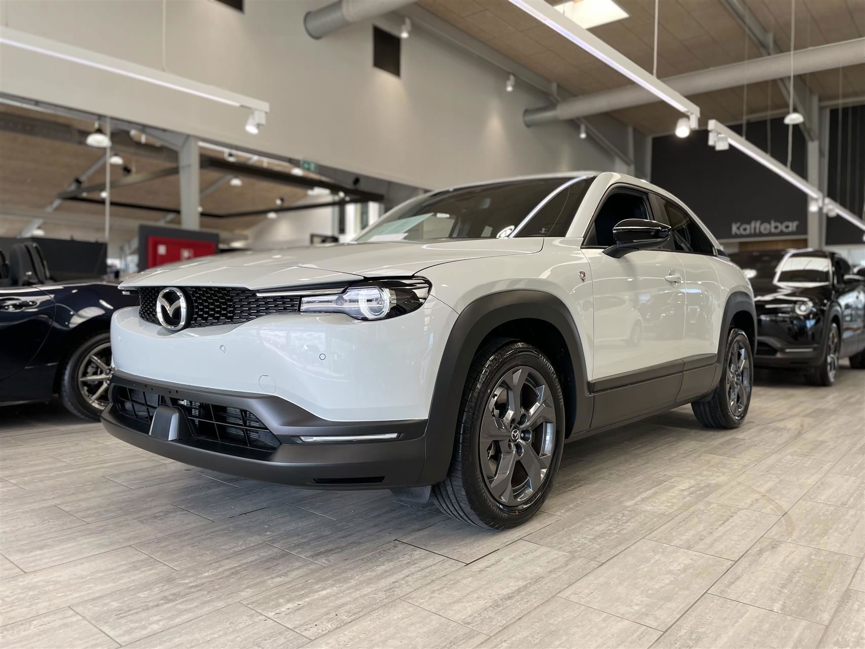 Mazda MX-30 0,8 e-Skyactiv R-EV  Plugin-hybrid Exclusive-Line 170HK 5d Trinl. Gear