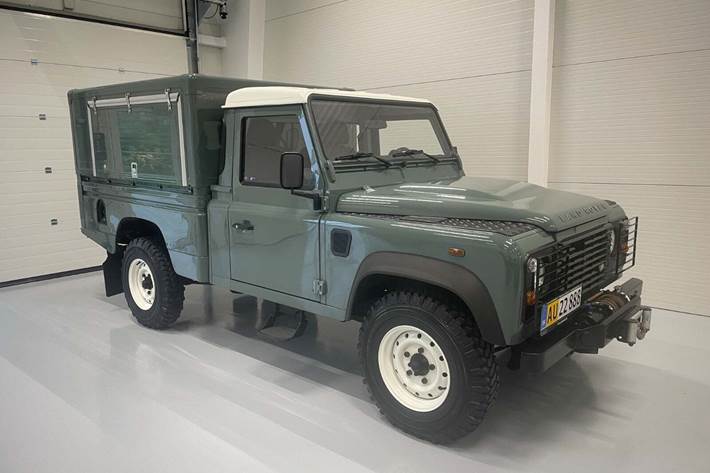 Grøn Land Rover Defender 110 fra 2009