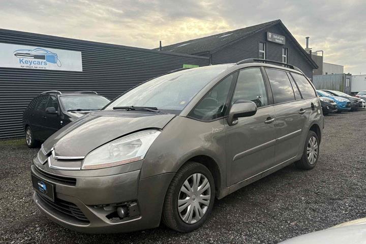 Orange Citroën C4 Picasso fra 2007 set udefra