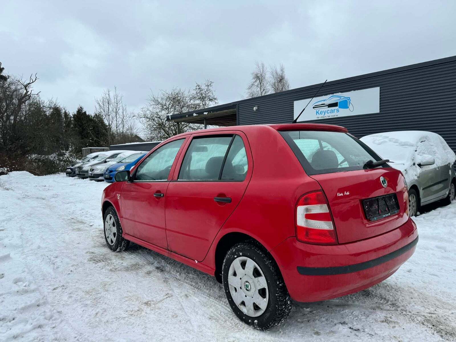 Rød Skoda Fabia fra 2004