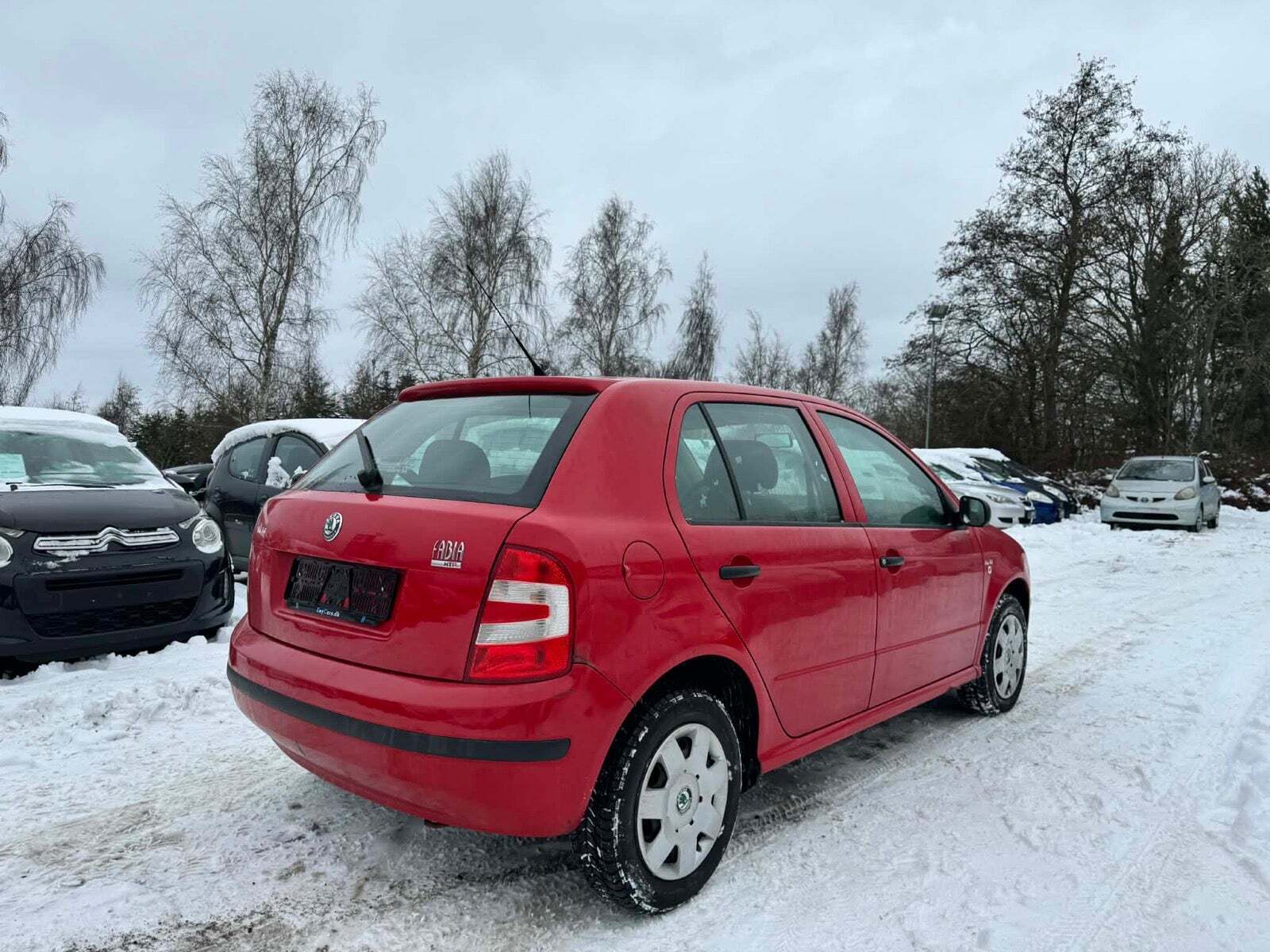 Rød Skoda Fabia fra 2004