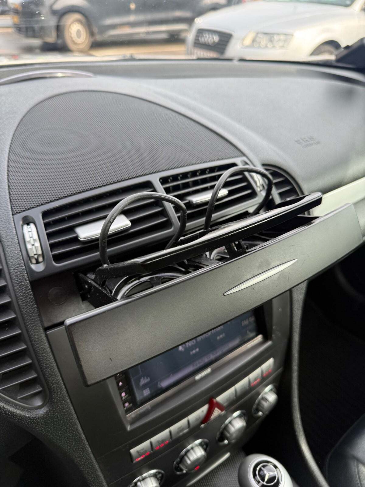 Orange Mercedes SLK200 fra 2006