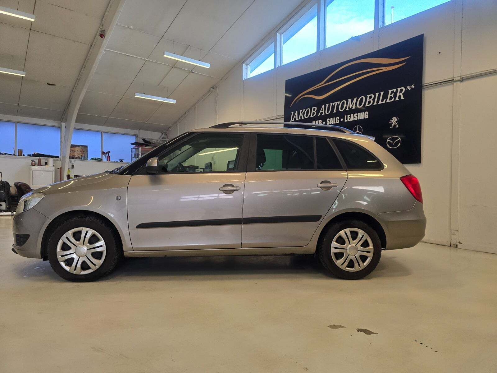 Orange Skoda Fabia fra 2013