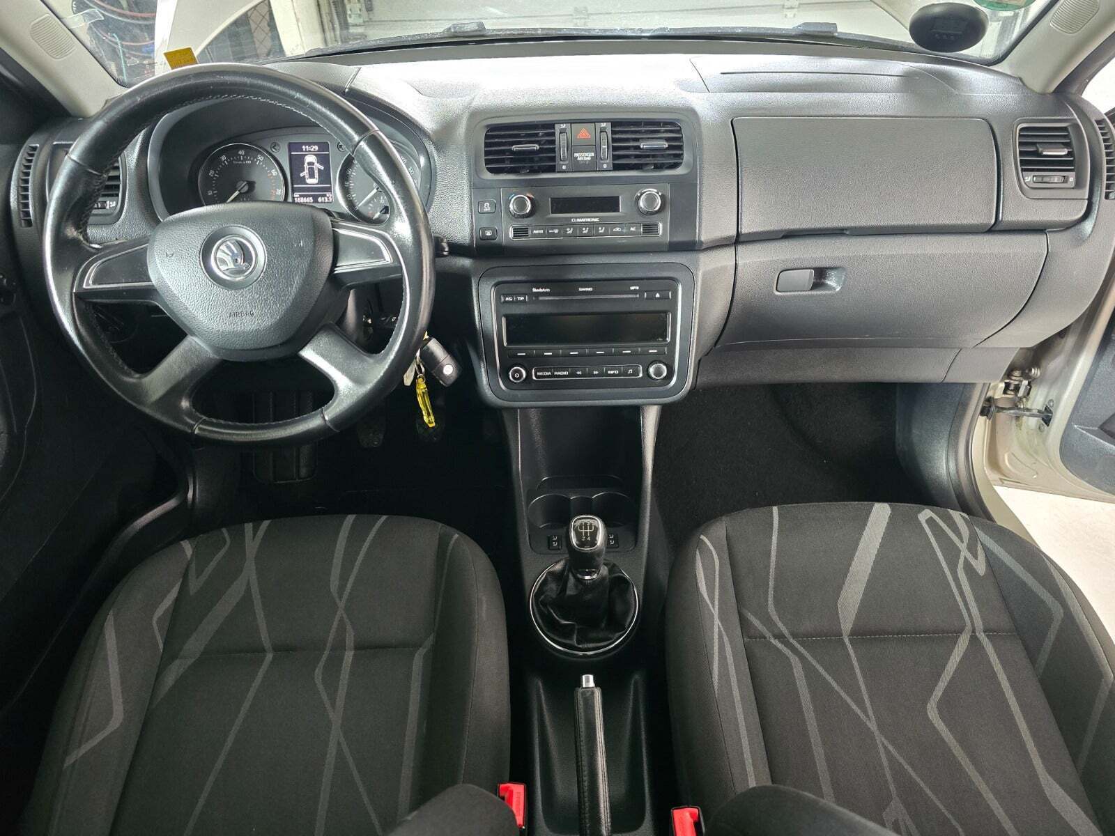 Orange Skoda Fabia fra 2013