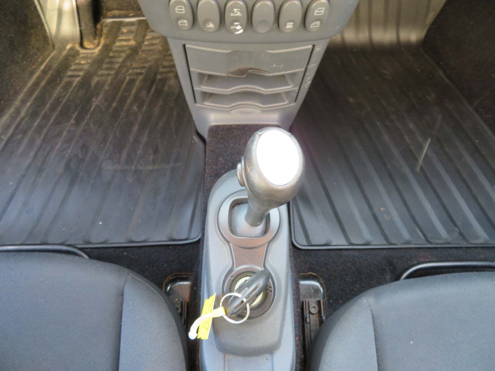 Rød Smart Roadster fra 2003