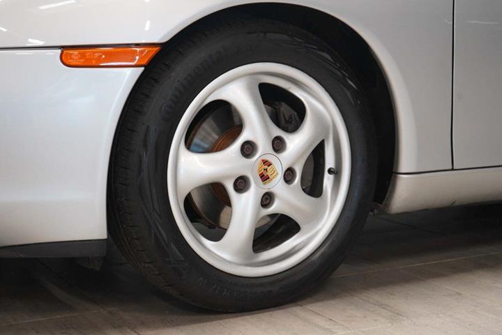 Sølv Porsche Boxster fra 1997