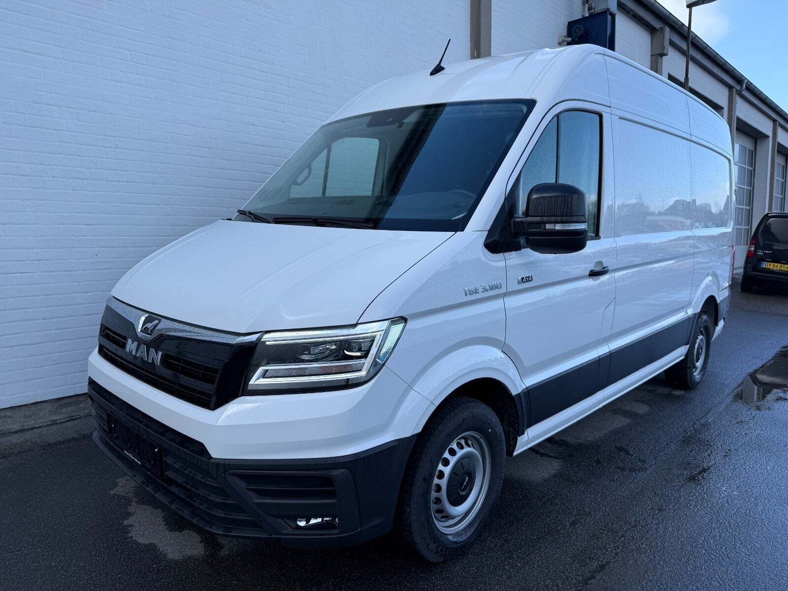 MAN TGE 2,0 3.180 Kassevogn L3H3 aut. AWD