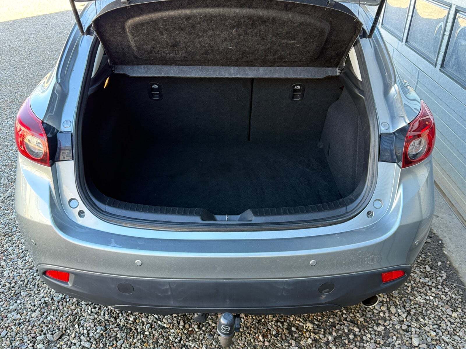 Sølv Mazda 3 fra 2013