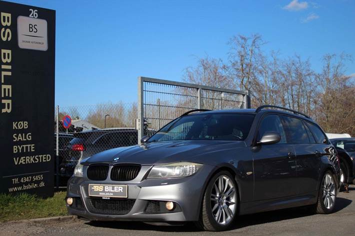 Grå BMW 335i fra 2009