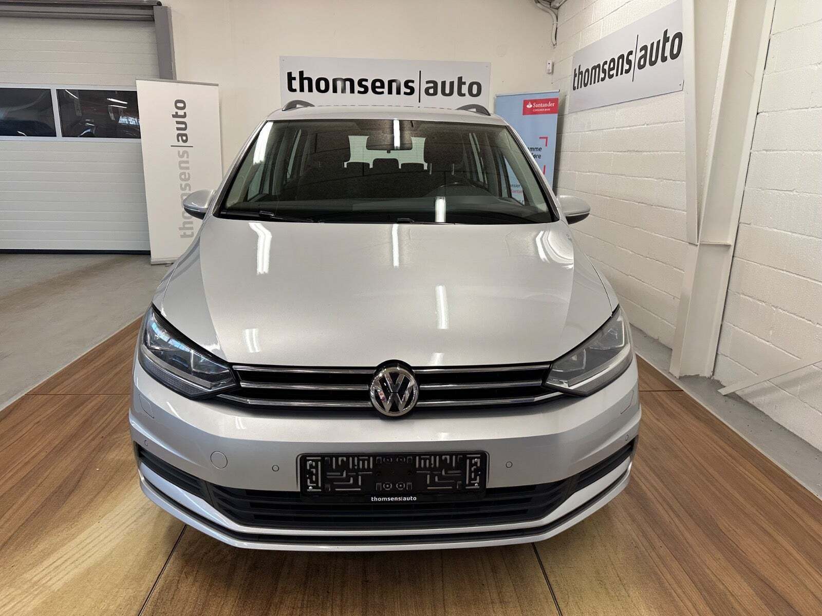 Sølv VW Touran fra 2016