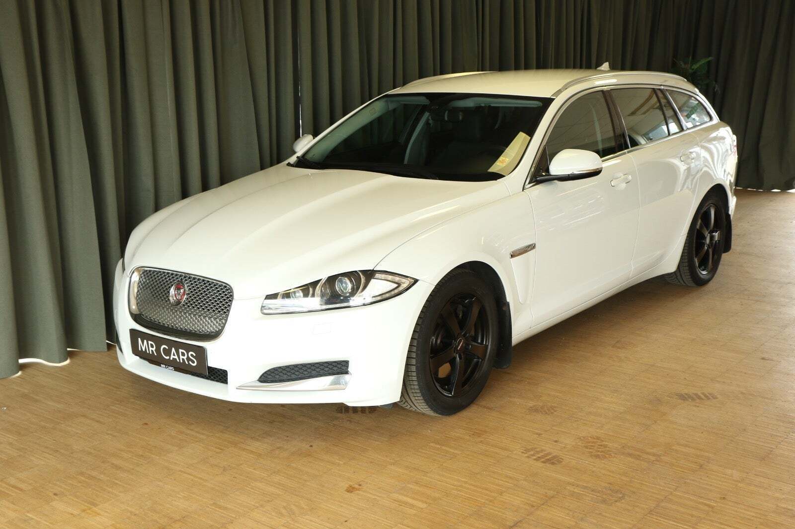 Grøn Jaguar XF fra 2014