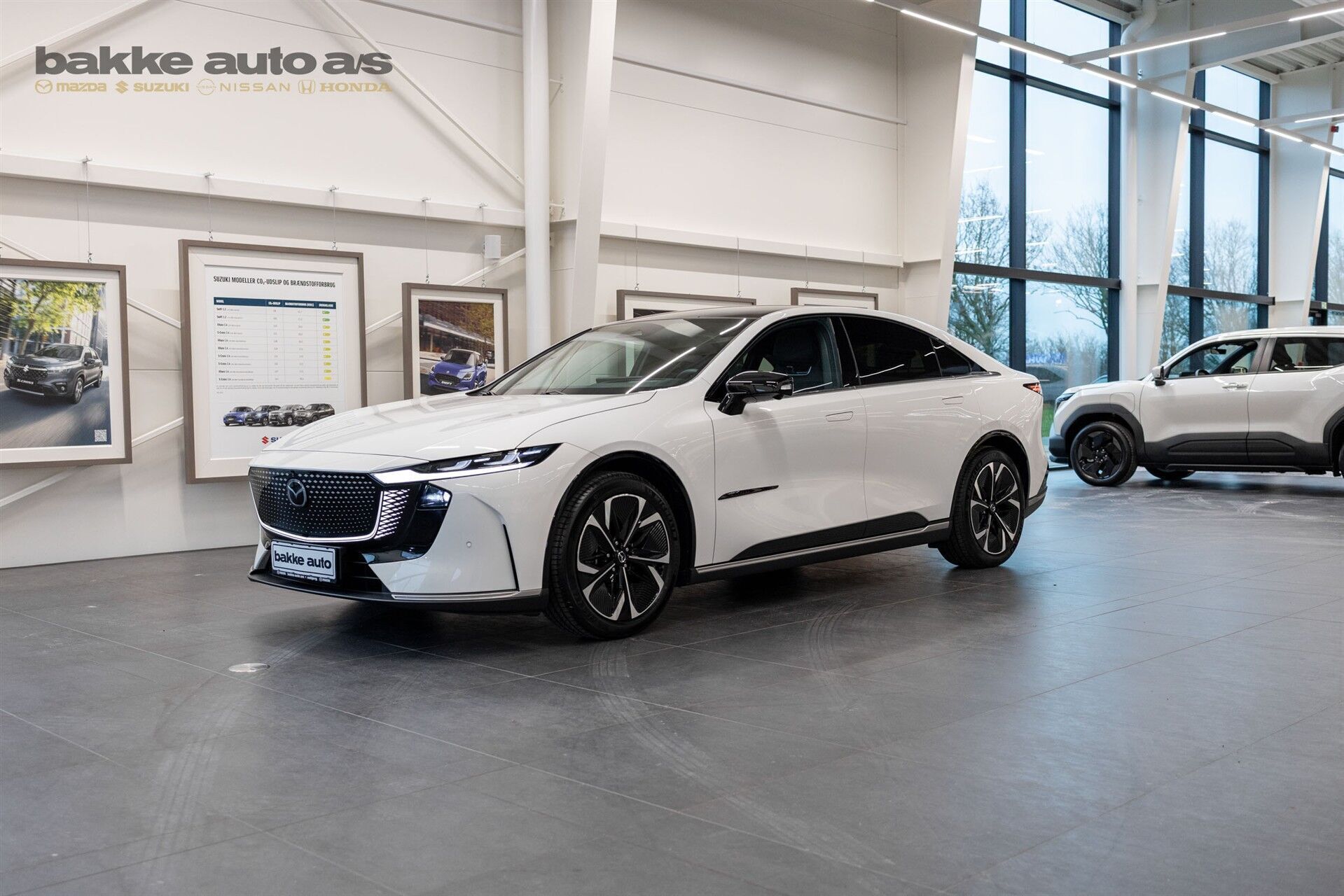 Mazda 6e EL Takumi 258HK 5d Aut.