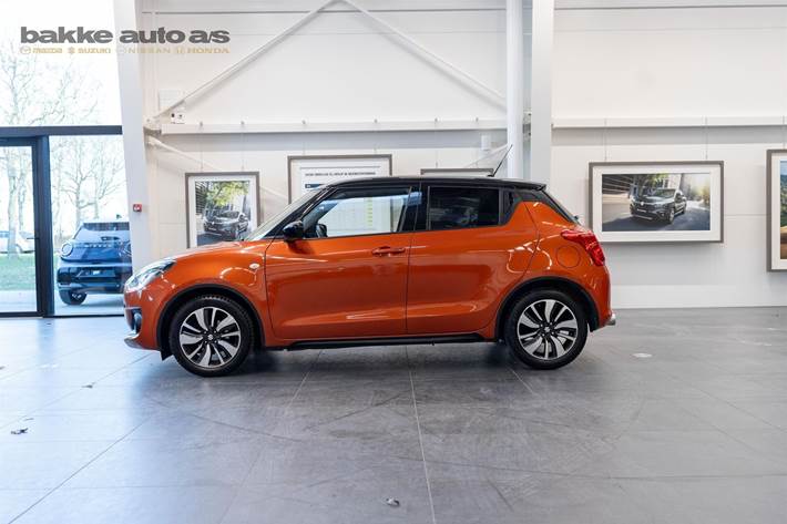 Orange Suzuki Swift fra 2023