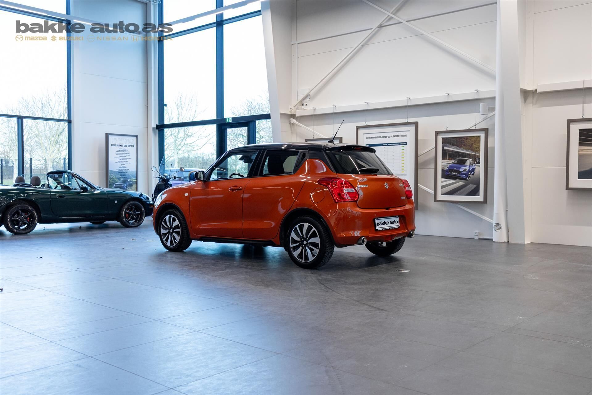 Orange Suzuki Swift fra 2023