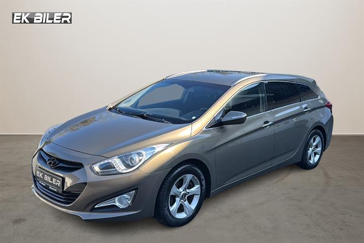 Brun Hyundai i40 fra 2012 set udefra