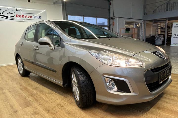 Brun Peugeot 308 fra 2012