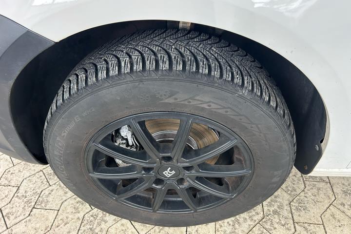 Hvid VW Caddy Maxi fra 2013