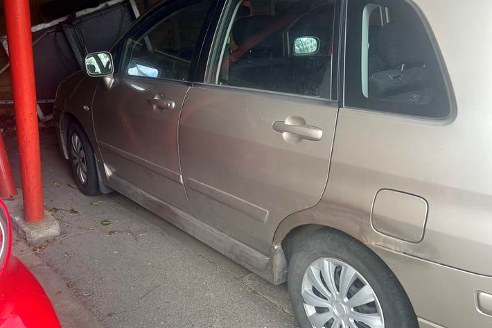 Beige Suzuki Liana fra 2004