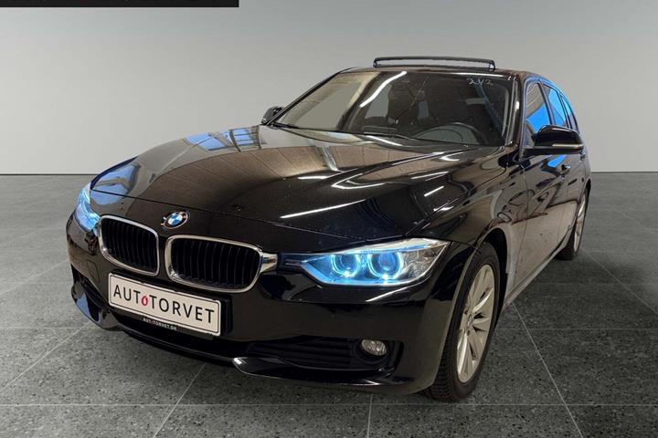 Sort BMW 318d fra 2015 set udefra