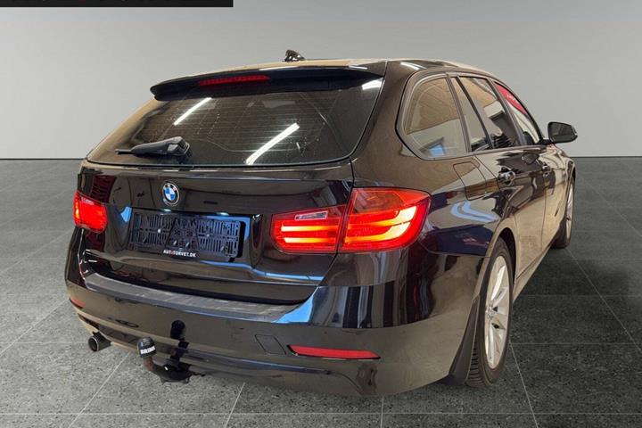 Sort BMW 318d fra 2015 set udefra