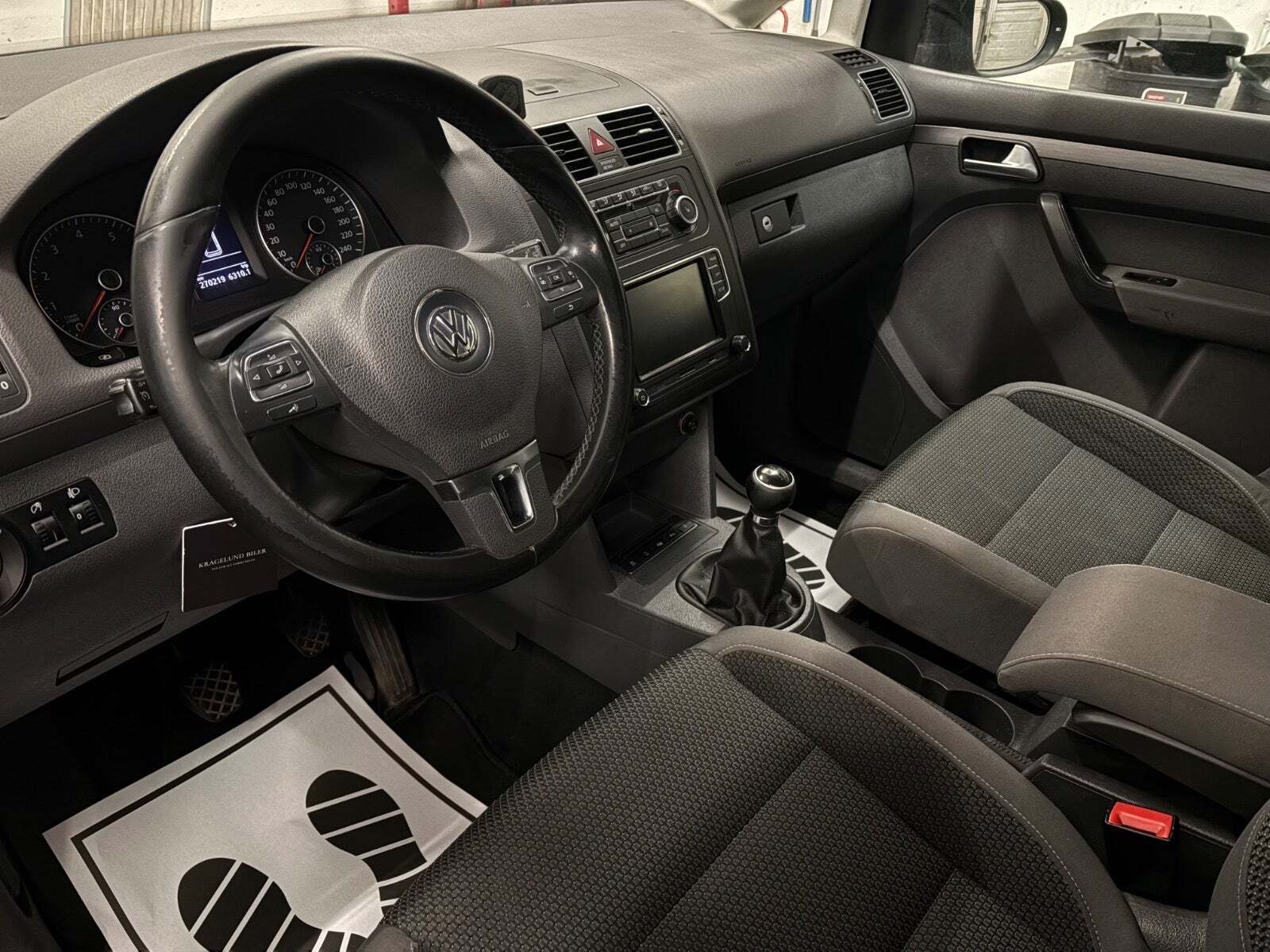 Grøn VW Touran fra 2011