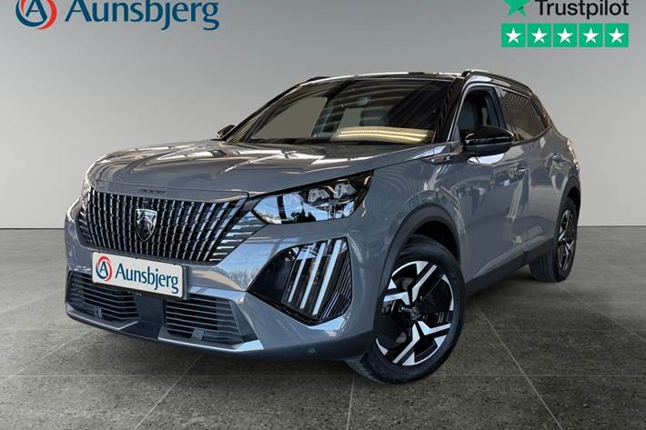 Grå Peugeot e-2008 fra 2024 set udefra