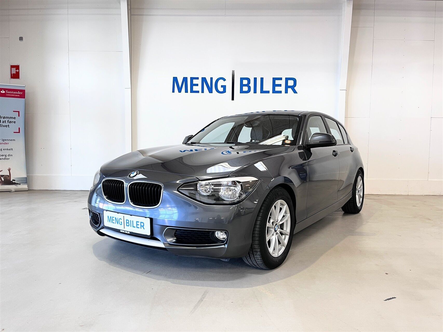 Grå BMW 116d fra 2012