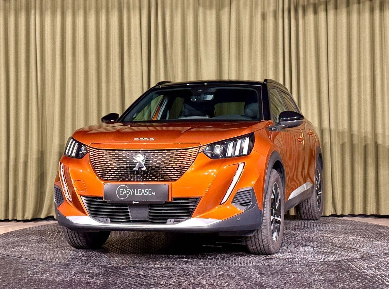 Orange Peugeot e-2008 fra 2023