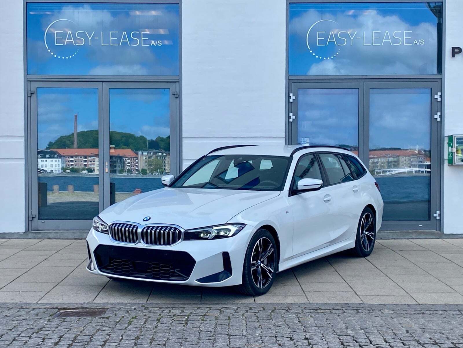 Hvid BMW 330i fra 2025