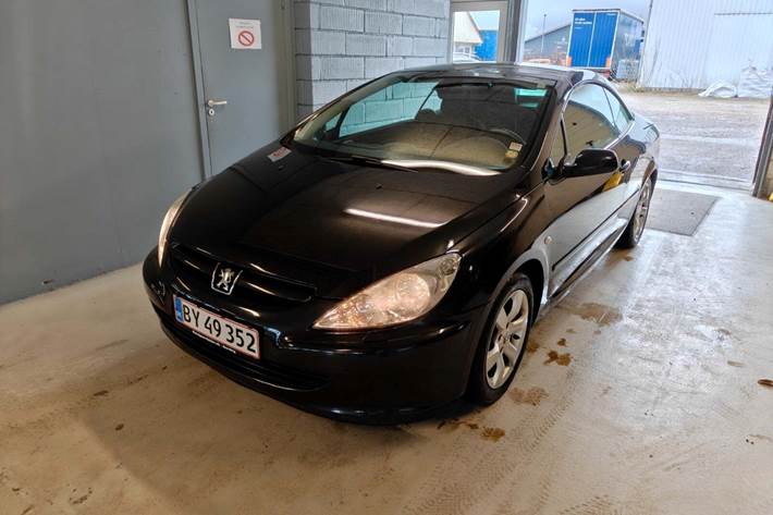 Gul Peugeot 307 fra 2005