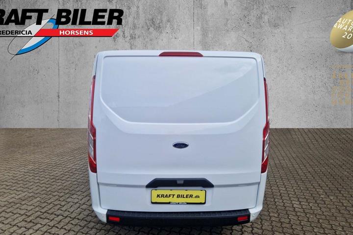 Hvid Ford Transit Custom 300 L1 fra 2023 set udefra