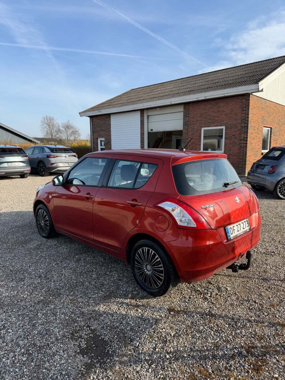 Gul Suzuki Swift fra 2011
