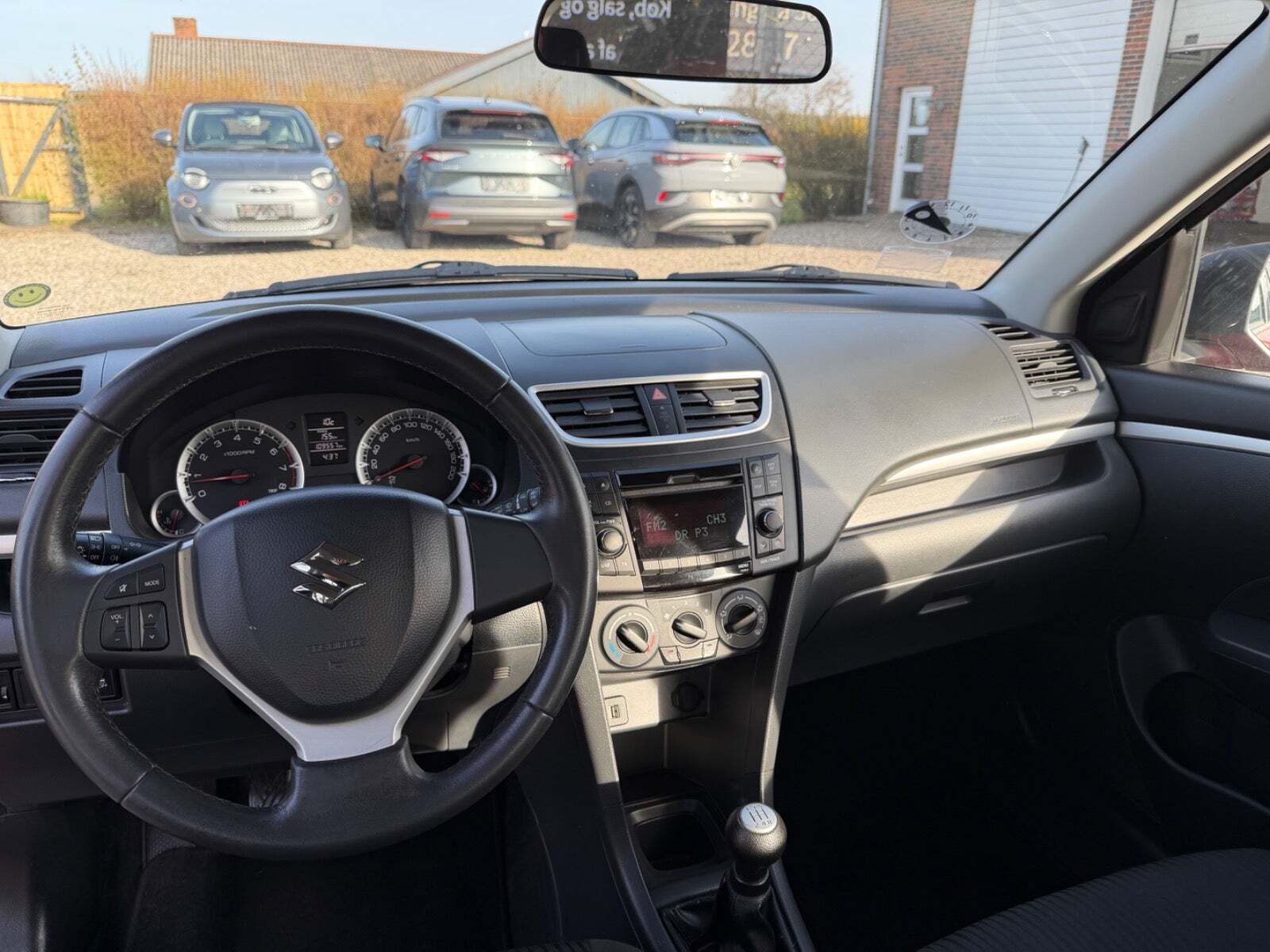 Gul Suzuki Swift fra 2011