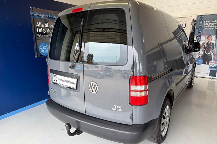 Grå VW Caddy fra 2013
